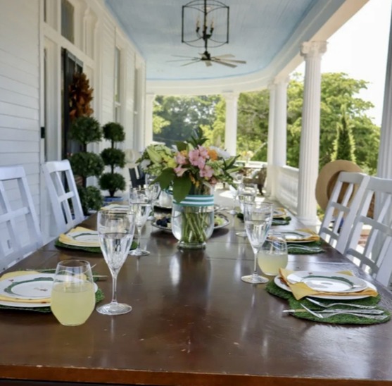 Dining table set on the porch at Mulligan’s on the Hill