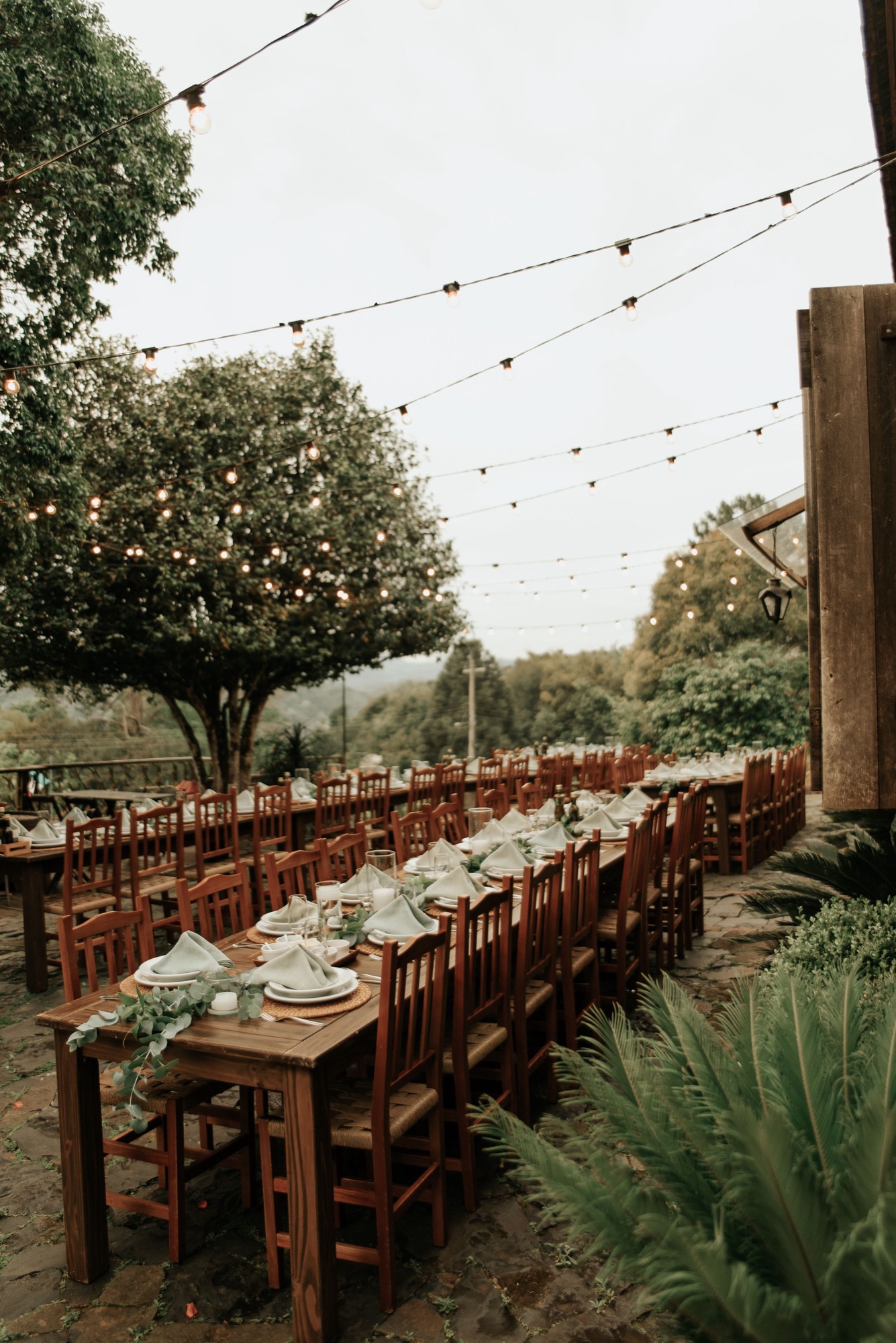 Garden tables under string lights